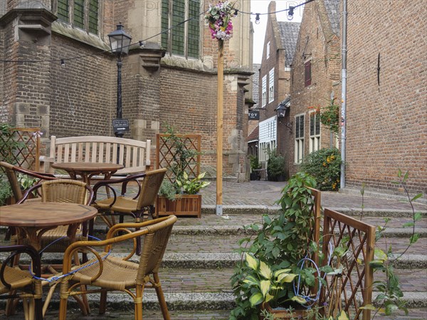 Cosy café with chairs and tables in a historic setting, nijmegen, the netherlands