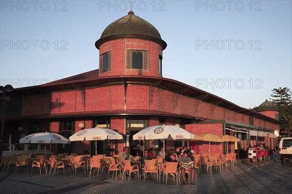 Evening atmosphere at the market hall in Olhao, Algarve, Portugal, Europe