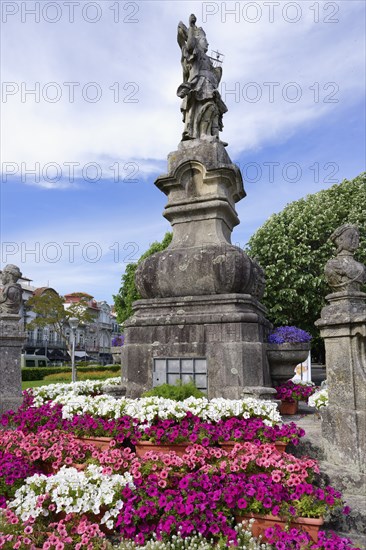 18th century statue of Viana holding in her hand a caravel, Symbol of the seafaring tradition of the city, Viana do Castelo, Minho, Portugal, Europe