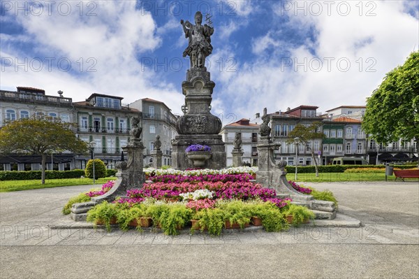 18th century statue of Viana holding in her hand a caravel, Symbol of the seafaring tradition of the city, Viana do Castelo, Minho, Portugal, Europe
