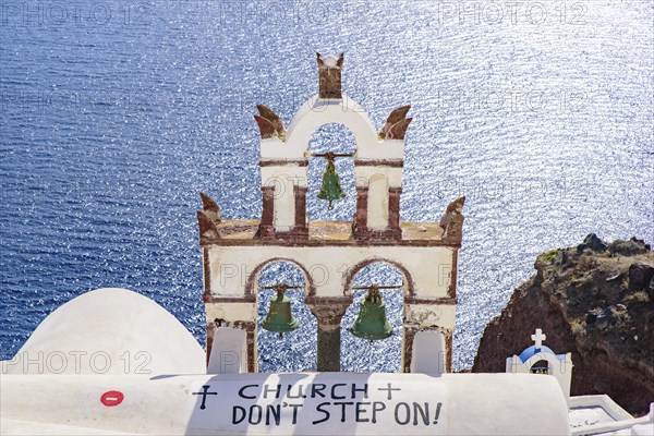 Three bell tower in Oia, Santorini, Greece, Europe