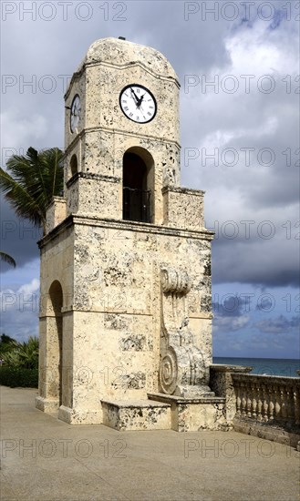 Clock Tower at the Atlantic in the Town Palm Beach, Florida, USA. Clock Tower at the Atlantic in the Town of Palm Beach, Florida, USA, North America