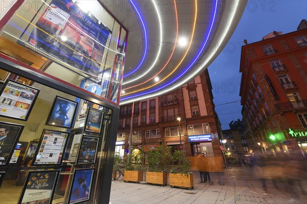 The Vox cinema in Strasbourg is illuminated at night. Bas-Rhin, Alsace, Grand Est, France, Europe