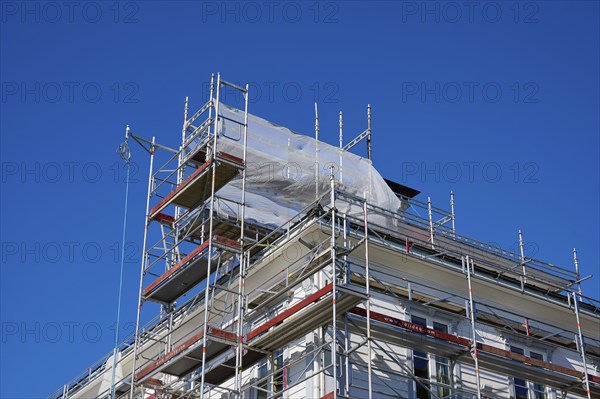 Scaffolding in front of a building under a clear blue sky, Fløibanen mountain station, Bergen, Vestland, Norway, Europe