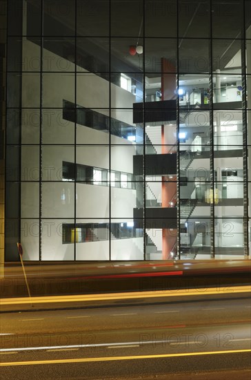 Office building in the center of Helsinki at night, vertical