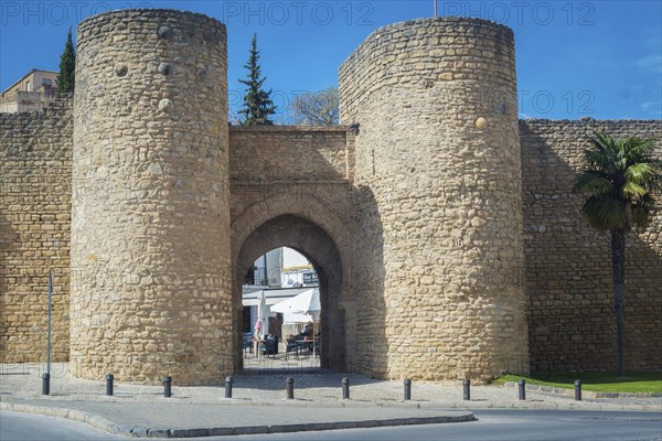 Ronda, Spain, April 2023: View on the Puerta de Almocabar, ancient gate to the town of Ronda, Spain, Europe