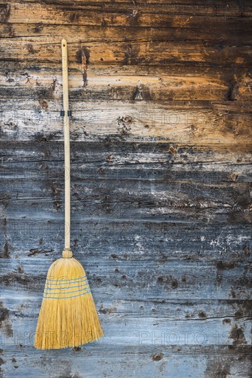 Broom on a wooden wall, hanging, cleanliness, purity, hut, detail, rural, tradition, decoration, symbol, symbolic