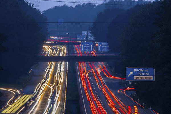 Motorway A40, Ruhrschnellweg, near Bochum, heavy evening traffic, in front of the motorway junction Bochum, A43, view in west direction