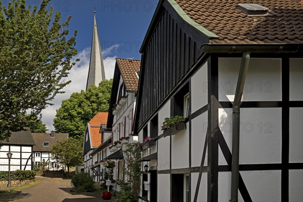 The old town centre with half-timbered houses and the church tower of Sankt Viktor, Schwerte, Ruhr area, North Rhine-Westphalia, Germany, Europe