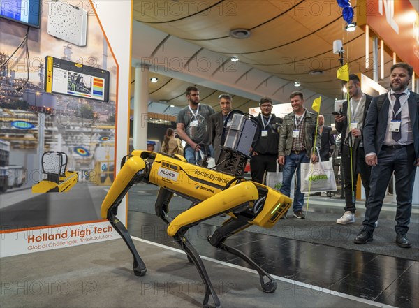 First day at Hannover Messe 2022, industrial trade fair, after a 2-year corona break, robot dog spot from Boston Dynamics, can be equipped with a wide variety of devices, e.g. for inspection in rooms, exhibition hall focussing on robotics, automation, plant engineering, Lower Saxony, Germany, Europe