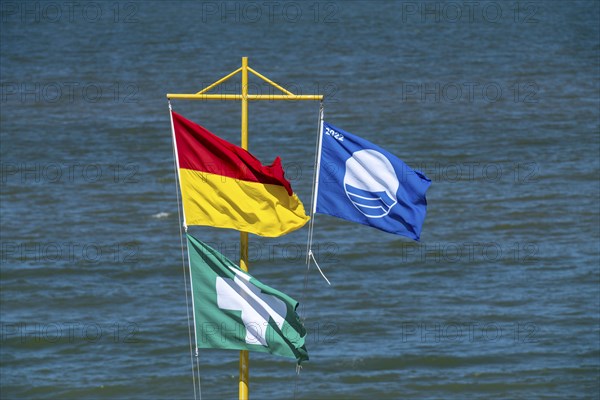 Beach of the village, Domburg in Zeeland, seaside resort, coast, flags on the beach, good water quality, guarded beach, first aid post, Netherlands