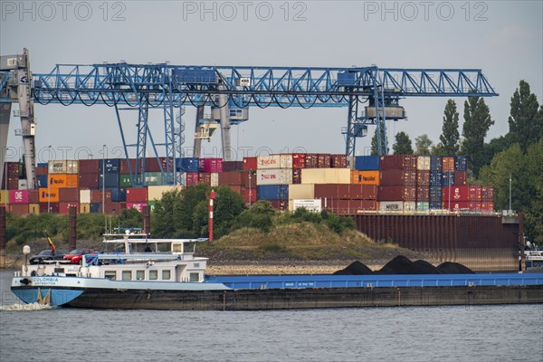 Rhine at Emmerich, extremely low water, Rhine level at 0 cm, tendency falling, reduced loaded coal freighter, in front of the Contargo Rhine-Waal-Lippe Container Terminal, North Rhine-Westphalia, Germany, Europe