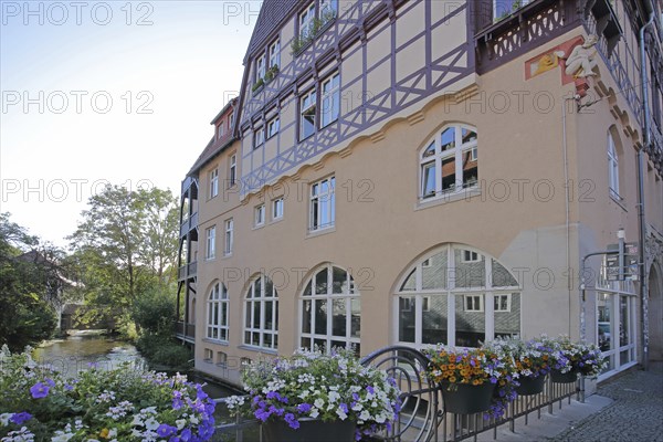 Historic house on the river Gera, Long Bridge, half-timbered house, floral decoration, Erfurt, Thuringia, Germany, Europe