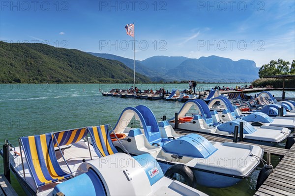Boat hire, pedal boats, Gretl am See lido on Lake Kaltern, near the village of Kaltern, in the Adige Valley in South Tyrol, one of the two warmest lakes in the Alps, bathing lake, surrounded by vineyards and apple orchards, Italy, Europe