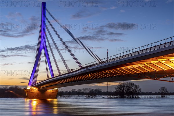 The Rhine bridge in Wesel, Lower Rhine bridge, road bridge of the federal road B58, evening lighting, flood, Wesel, North Rhine-Westphalia, Germany, Europe