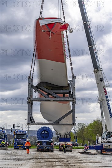 Preparation for the transport of a 68 metre long blade, a wind turbine, with a self-propelled Blade-Lifter vehicle, over a 40 km long route in the Bergisches Land, through towns, villages, over country roads, narrow through roads, to the construction site of the wind turbine near Hagen, North Rhine-Westphalia, Germany, Europe