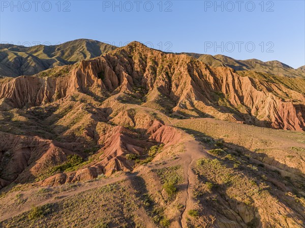Aerial view, eroded mountain landscape, sandstone cliffs, canyon with red and orange rock formations, Farytale Canyon Skazka, Issyk Kul, Kyrgyzstan, Asia