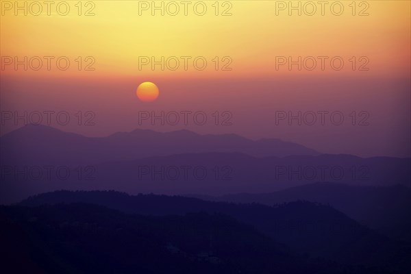Sunset in Himalayas Shivalik hills. Shimla, Himachal Pradesh, India, Asia