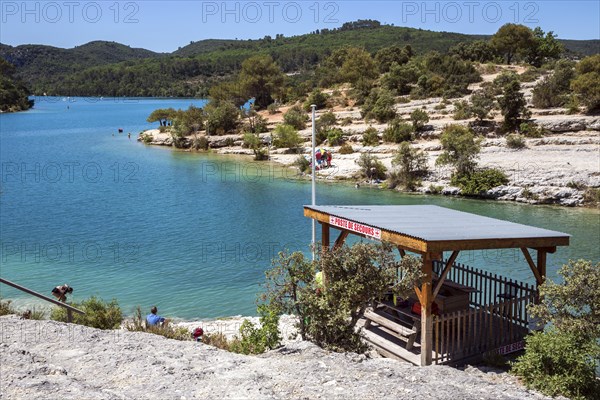 Bathing spot on the rocky beach at Lac d Esparron, Esparron-de-Verdon, Provence-Alpes-Côte d'Azur, Provence, France, Europe