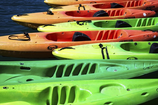Colourful canoes in the boat harbour in Esparron-de-Verdon, Lac d Esparron, Provence-Alpes-Côte d'Azur, Provence, France, Europe