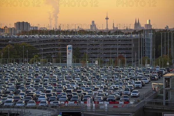 Full car park P2, at Cologne-Bonn Airport, behind car park P3 and the Cologne skyline, North Rhine-Westphalia, Germany, Europe