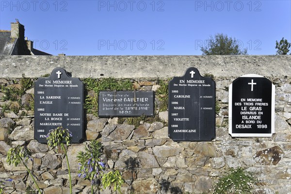 Wall of the Departed at the Ploubazlanec cemetery with the names of 120 boats and 2000 Iceland fishermen lost at sea in the Icelandic waters, Côtes-d'Armor, Brittany, France, Europe
