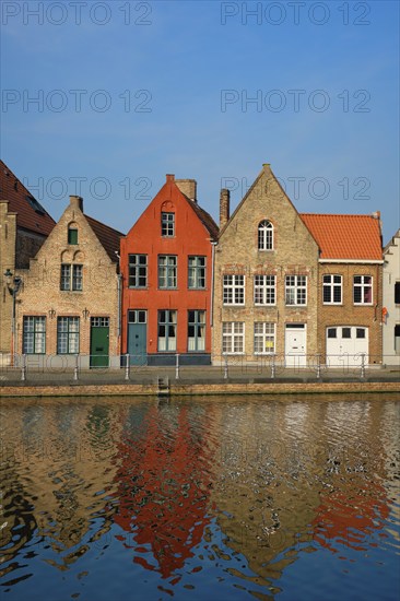 Typical Belgian cityscape Europe tourism concept, canal and old houses on sunset. Bruges (Brugge), Belgium, Europe