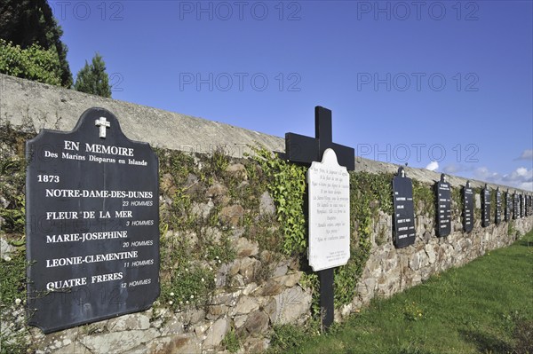 Wall of the Departed at the Ploubazlanec cemetery with the names of 120 boats and 2000 Iceland fishermen lost at sea in the Icelandic waters, Côtes-d'Armor, Brittany, France, Europe