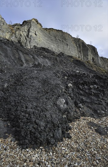 Black Ven landslide on beach between Lyme Regis and Charmouth along the Jurassic Coast, Dorset, southern England, UK