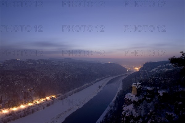 Bastei rock at full moon in winter