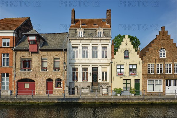 Bruges typical Belgian cityscape Europe tourism concept, canal and old Flemish houses. Brugge, Belgium, Europe