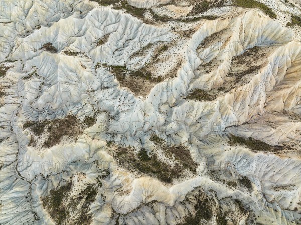 Bare ridges of eroded sandstone in the badlands of the Tabernas Desert, Europe's only true desert, aerial view, drone shot, Almería province, Andalusia, Spain, Europe