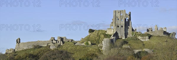 Ruins of the medieval Corfe Castle on the Isle of Purbeck along the Jurassic Coast in Dorset, southern England, UK