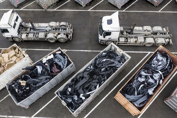 Plastic parts of the Tesla Y model are provided in containers for recycling at the Tesla Giga Factory site for collection, Grünheide, 28 01 2023