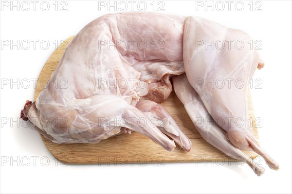 Whole raw rabbit isolated on a white background. Side view, close up