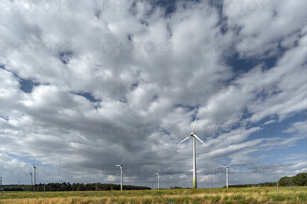Wind turbines on the A 9 motorway, cloudy sky, Thuringia, Germany, Europe