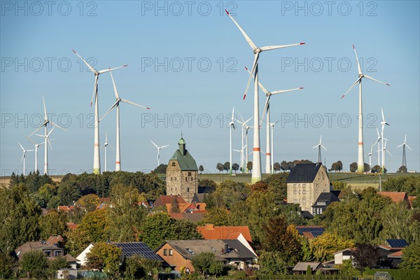 Wind farm above the village of Lichtenau, self-proclaimed energy town, houses with photovoltaic systems on the roofs, Paderborn district, OWL, A North Rhine-Westphalia, Germany, Europe