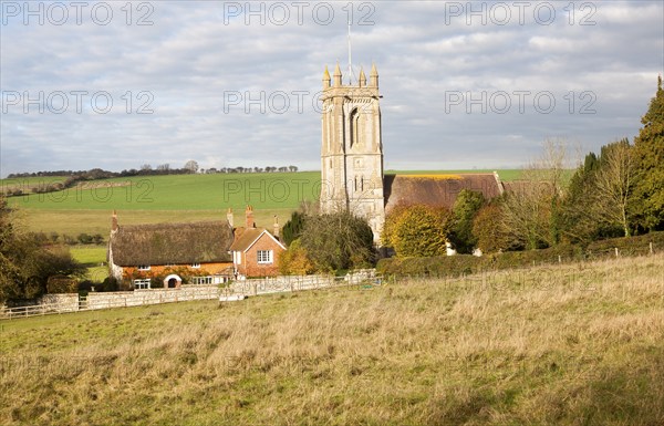 Parish church St Michael and All Angels village of West Overton in Wiltshire, England, UK in the River Kennet valley
