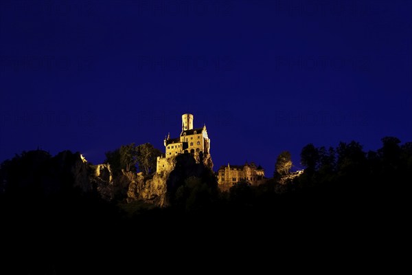 Lichtenstein Castle, night shot, artificial light, fairytale castle of Württemberg, illuminated, mood, romantic, historicist building, gerobau on the right, landmark of the Swabian Alb, Honau, Lichtenstein, district of Reutlingen, Baden-Württemberg, Germany, Europe