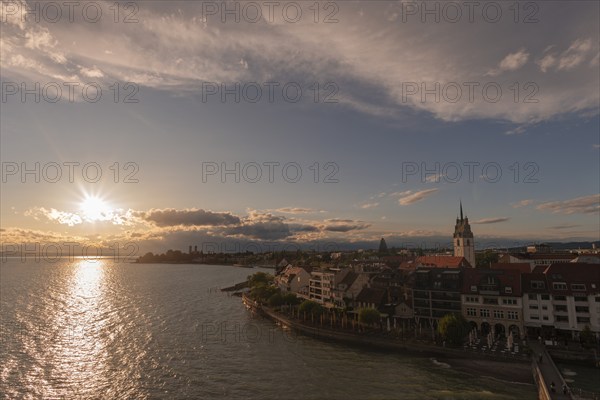 Cityscape, waterfront promenade, church tower, evening light, water reflection, Friedrichshafen on Lake Constance Baden-Württemberg, Germany, Europe