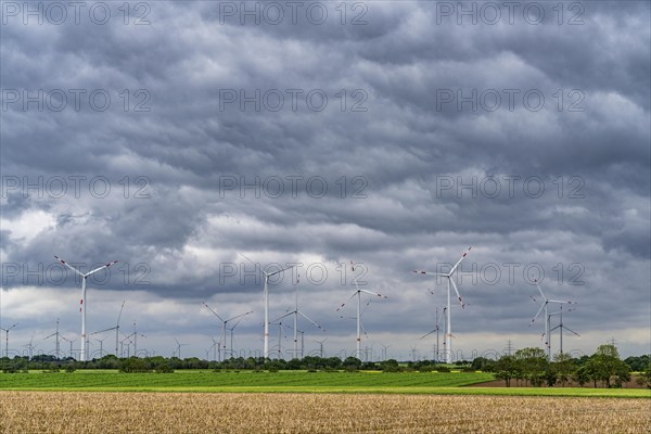 Wind farm east of Geilenkirchen, dark storm clouds, strong wind, North Rhine-Westphalia, Germany, Europe