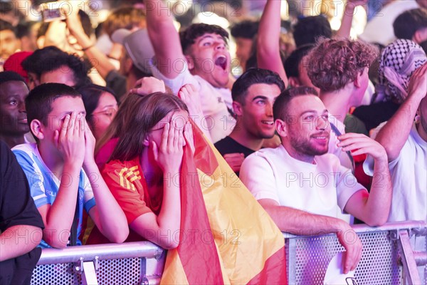 Fans of the Spanish team fear after the equalising goal by England at the Adidas fan zone at the Bundestag during the final match between Spain and England at the European Football Championship, Berlin, 14.07.2024