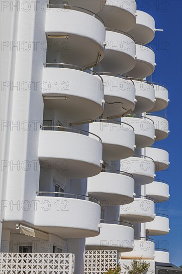 Modern holiday flats with round balconies at the harbour of Santa Eularia, Ibiza, Balearic Islands, Mediterranean Sea, Spain, Europe