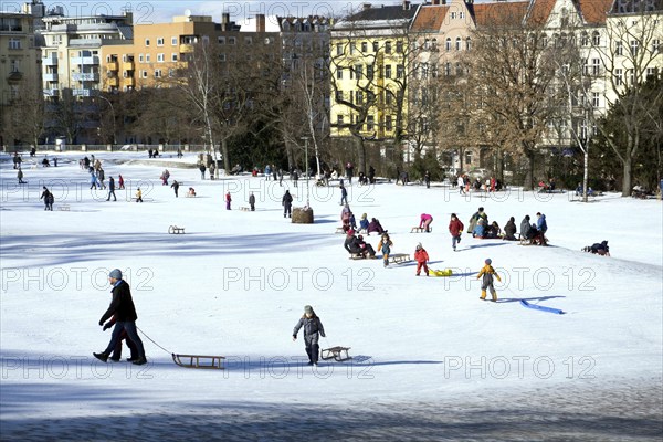 Tobogganing fun in Berlin's snow-covered Viktoriapark. Snow and icy cold continue to dominate the weather, 13.02.21