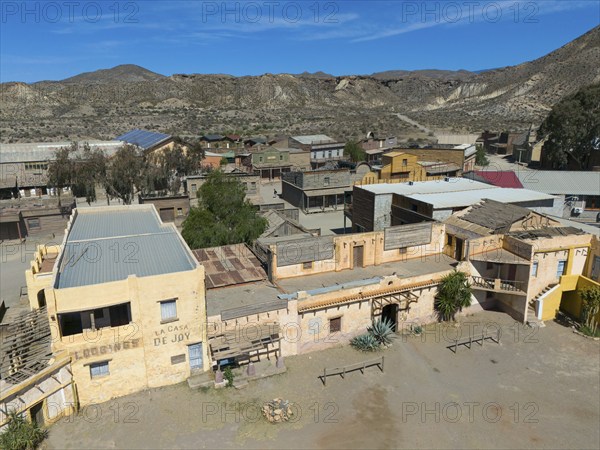 An abandoned western town in a dry desert landscape in sunny weather, aerial view, Fort Bravo, western town, desert, Desierto de Tabernas, Tabernas, Almeria, Andalusia, Spain, Europe