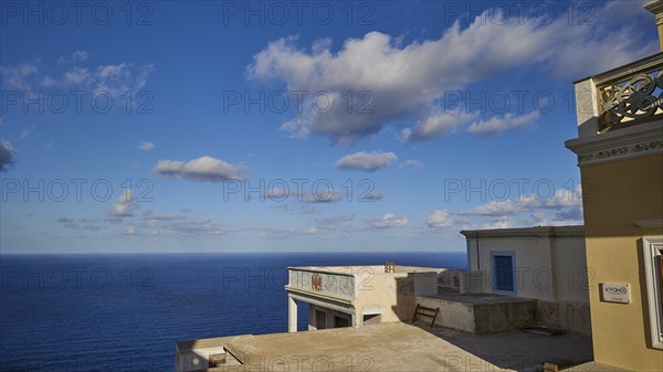 View of the vast sea and sky from a building with balcony, Colourful mountain village, Morning light, Olymbos, Karpathos, Dodecanese, Greek Islands, Greece, Europe