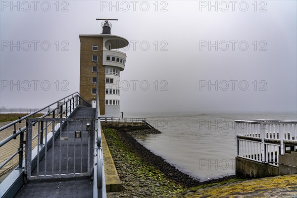 Thick fog in winter, hangs over the mouth of the Elbe into the North Sea, radar tower of the Water and Shipping Authority (WSA) Cuxhaven, viewpoint Alte Liebe in Cuxhaven, Lower Saxony, Germany, Europe