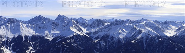 Alpine panorama with snow-covered mountain peaks in winter. Taken in the ski resort of Serfaus Fiss Ladis (Tyrol, Austria)