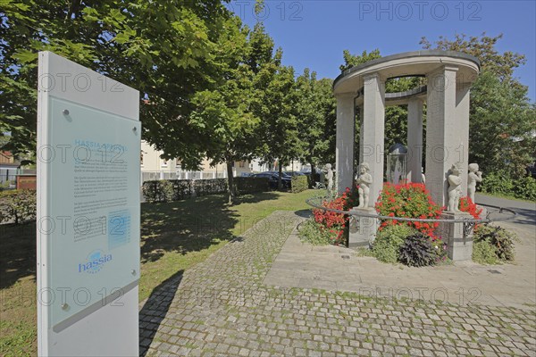 Mineral water Hassia Sprudel fountain, healing spring, info text, info board, inscription, columns, spa gardens, Bad Vilbel, Wetterau, Hesse, Germany, Europe