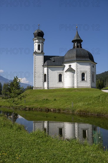 Seekirchl mi reflection, Heiligkreuzkirche, view from the parish hill, Seefeld, Tyrol, Austria, Europe